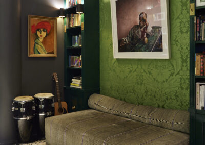 Casa Maxima 26 Primary Bedroom Study with Green Theme