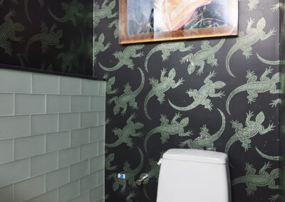 Casa Maxima 30 Primary Bathroom Toilet and Wall Art