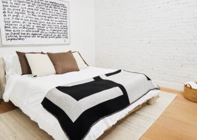 cocoon casa strand guest bedroom white walls