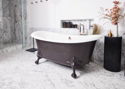 cocoon casa strand master marble bathroom clawfoot tub closeup